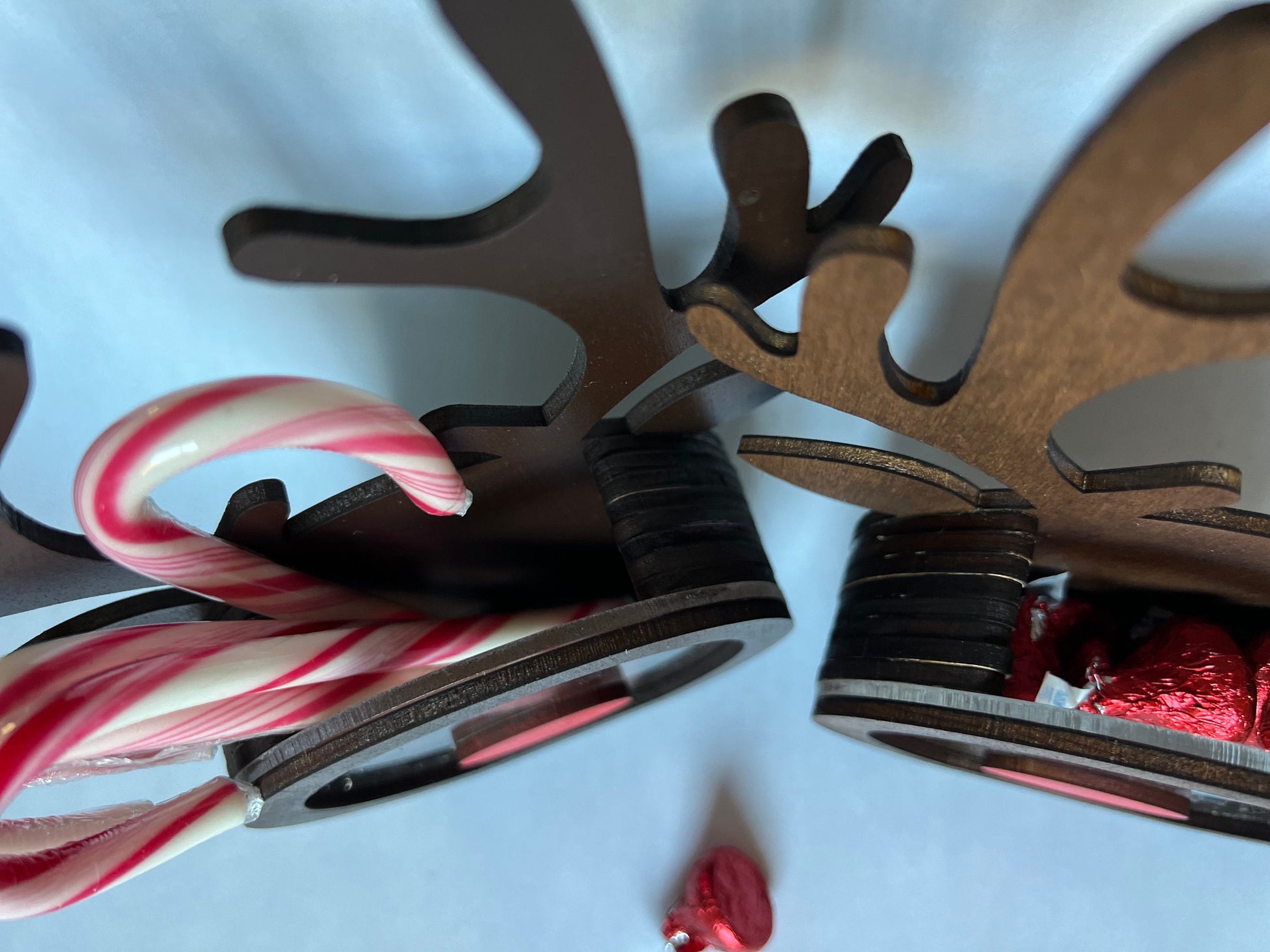 Handcrafted wooden reindeer candy holder